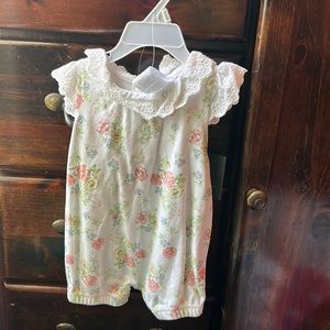 White romper with colorful flowers, brand Laura Ashley baby, size 3-6 months